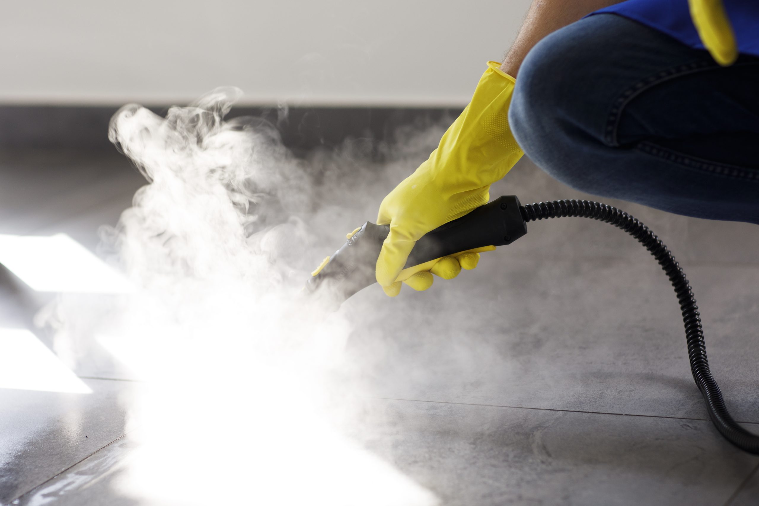 professional-cleaning-service-person-using-steam-cleaner-office (2)